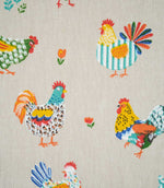 Close-up of Cottage Hens Multi fabric showing detailed multicoloured roosters and hens in blue, green, yellow and orange on a beige background.