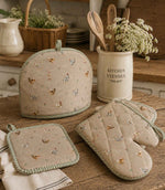 Country kitchen tea cosy and oven mits, with chickens and hen fabric patterns
