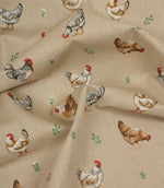 Draped chicken print fabric with detailed farmyard hen illustrations on a textured beige linen-effect fabric.