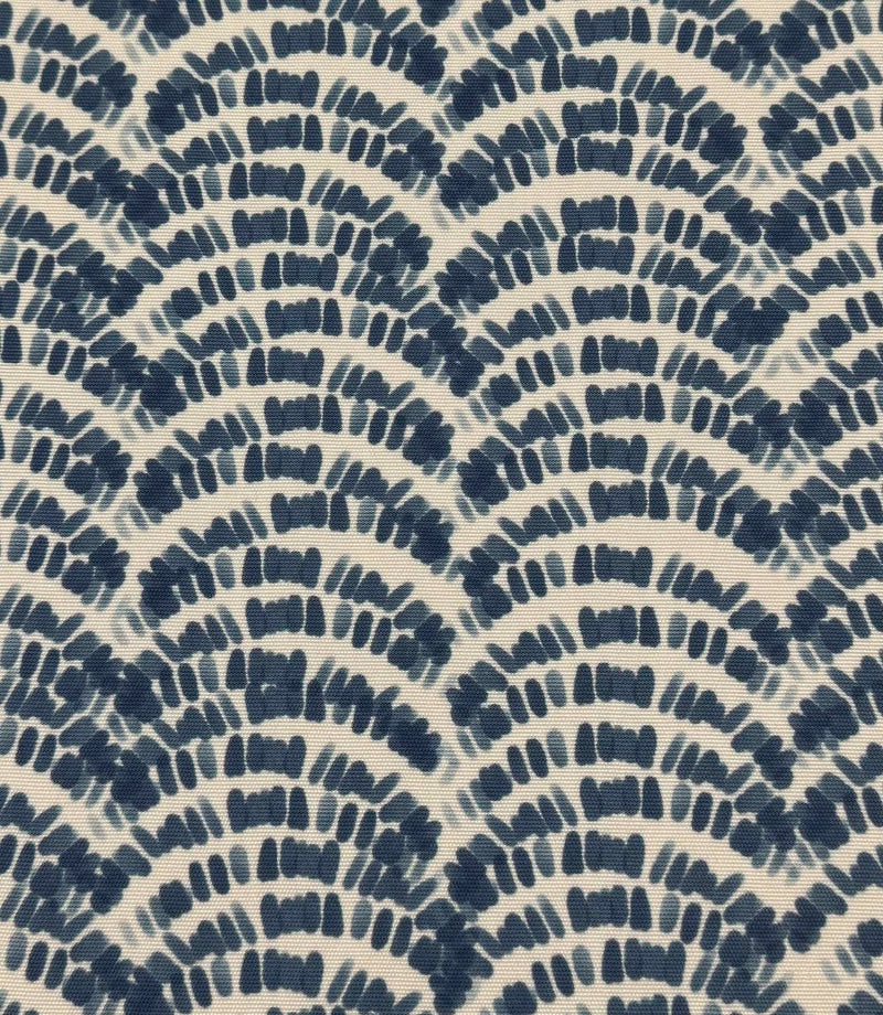 Outdoor upholstery fabric featuring layered navy and denim blue botanical wave motifs on a cream base.