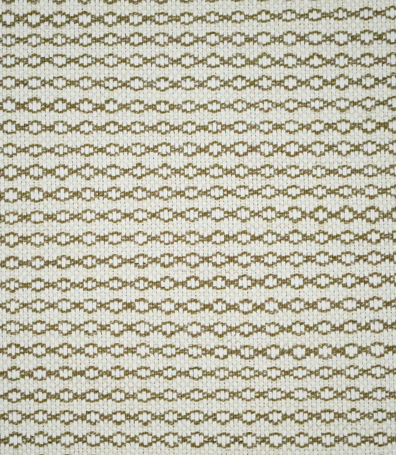 Full view of Elkstone Matcha woven fabric showing a small-scale geometric pattern of repeating olive green linked shapes across a natural cream background.
