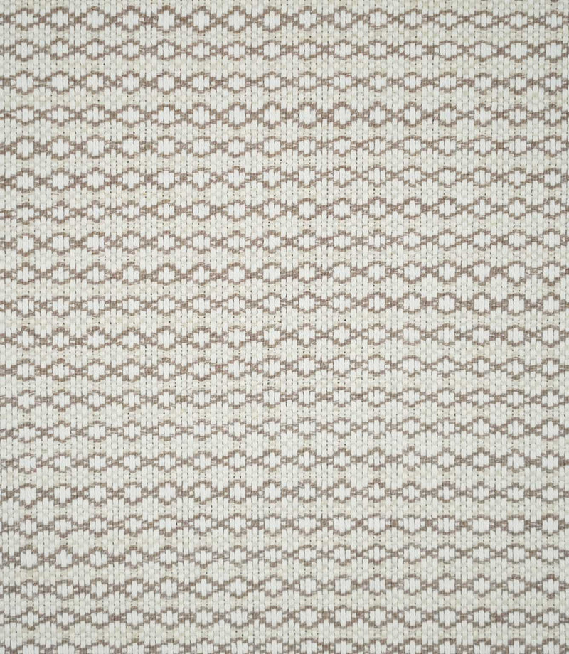 Full view of Elkstone Taupe woven fabric showing a small-scale geometric pattern of interlocking taupe shapes across a natural cream background.