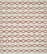 Close-up of Elkstone Terracotta upholstery fabric featuring a textured natural cream weave with repeating terracotta geometric motifs arranged in narrow horizontal rows.