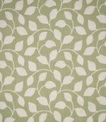 Ellerton Apple embroidered fabric featuring a flowing cream foliage design with softly curved stems and rounded leaves across a fresh apple green woven background, shown flat to clearly display the repeating contemporary botanical pattern.