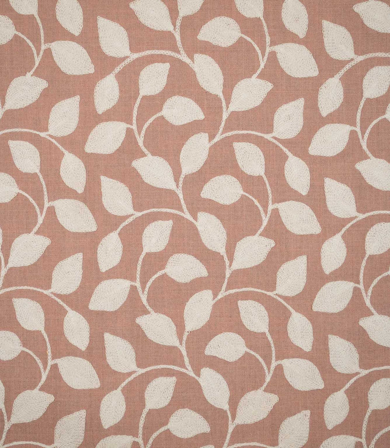 Ellerton Blush embroidered fabric featuring a flowing cream botanical leaf design with gently curving stems and rounded leaves across a soft blush pink woven background, shown flat to clearly display the full repeating foliage pattern and textured embroidery.