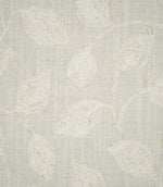 Detailed close-up of Ellerton Cloud fabric showing raised ivory embroidered leaves connected by slender, curving stems on a pale cloud-grey woven ground, highlighting the individual stitches, softly textured weave and tactile finish of the botanical embroidery.