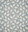 Ellerton Cornflower embroidered fabric featuring a flowing cream foliage design of softly curved stems and leaves across a muted cornflower blue woven background, shown flat to clearly display the repeating botanical pattern.