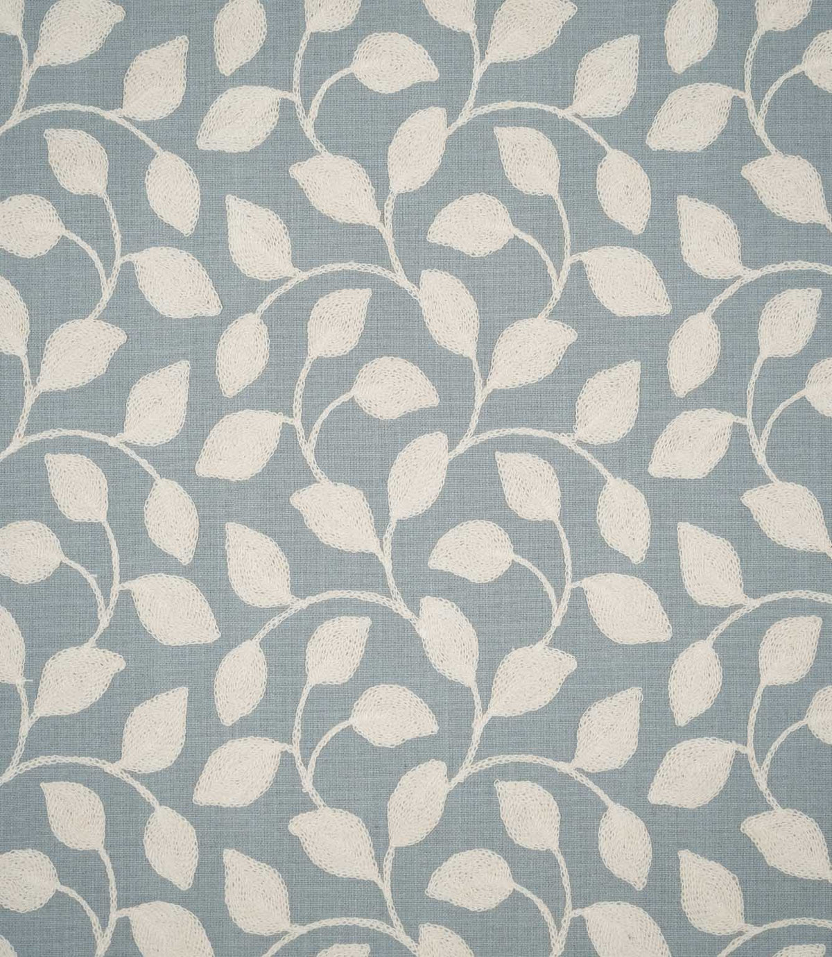 Ellerton Cornflower embroidered fabric featuring a flowing cream foliage design of softly curved stems and leaves across a muted cornflower blue woven background, shown flat to clearly display the repeating botanical pattern.