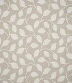 Ellerton embroidered foliage fabric featuring a repeating design of cream leaves and gently curving stems across a natural beige woven background, shown flat to display the full botanical pattern.
