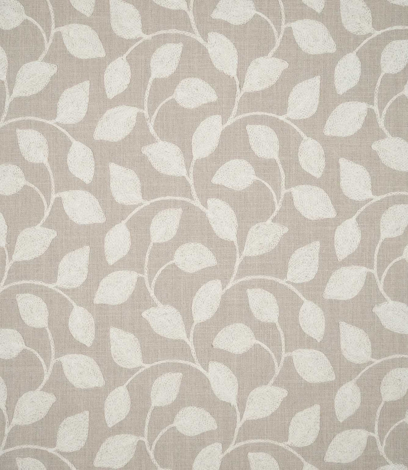 Ellerton embroidered foliage fabric featuring a repeating design of cream leaves and gently curving stems across a natural beige woven background, shown flat to display the full botanical pattern.