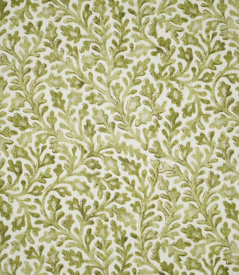 Elmsley Green sustainable fabric featuring a small-scale botanical print of softly flowing leaves, stems and stylised floral shapes in layered olive, moss and fresh green tones on a warm off-white ground.