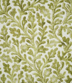 Close-up of Elmsley Green fabric showing the intricate small-scale floral and foliage design, with hand-drawn outlines, softly mottled green leaves and branching botanical forms on an off-white background.