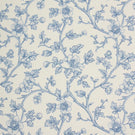 Blue floral fabric with a delicate trailing vine design on an ivory background, featuring soft blue flowers, leaves, and buds.