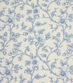 Blue floral fabric with a delicate trailing vine design on an ivory background, featuring soft blue flowers, leaves, and buds.