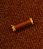 Everleigh Copper upholstery fire retardant fabric with coordinating copper thread, highlighting the textured plain design and velour-inspired finish.