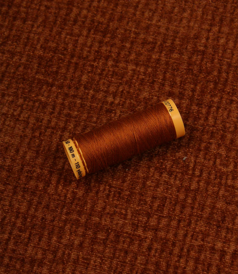 Everleigh Copper upholstery fire retardant fabric with coordinating copper thread, highlighting the textured plain design and velour-inspired finish.