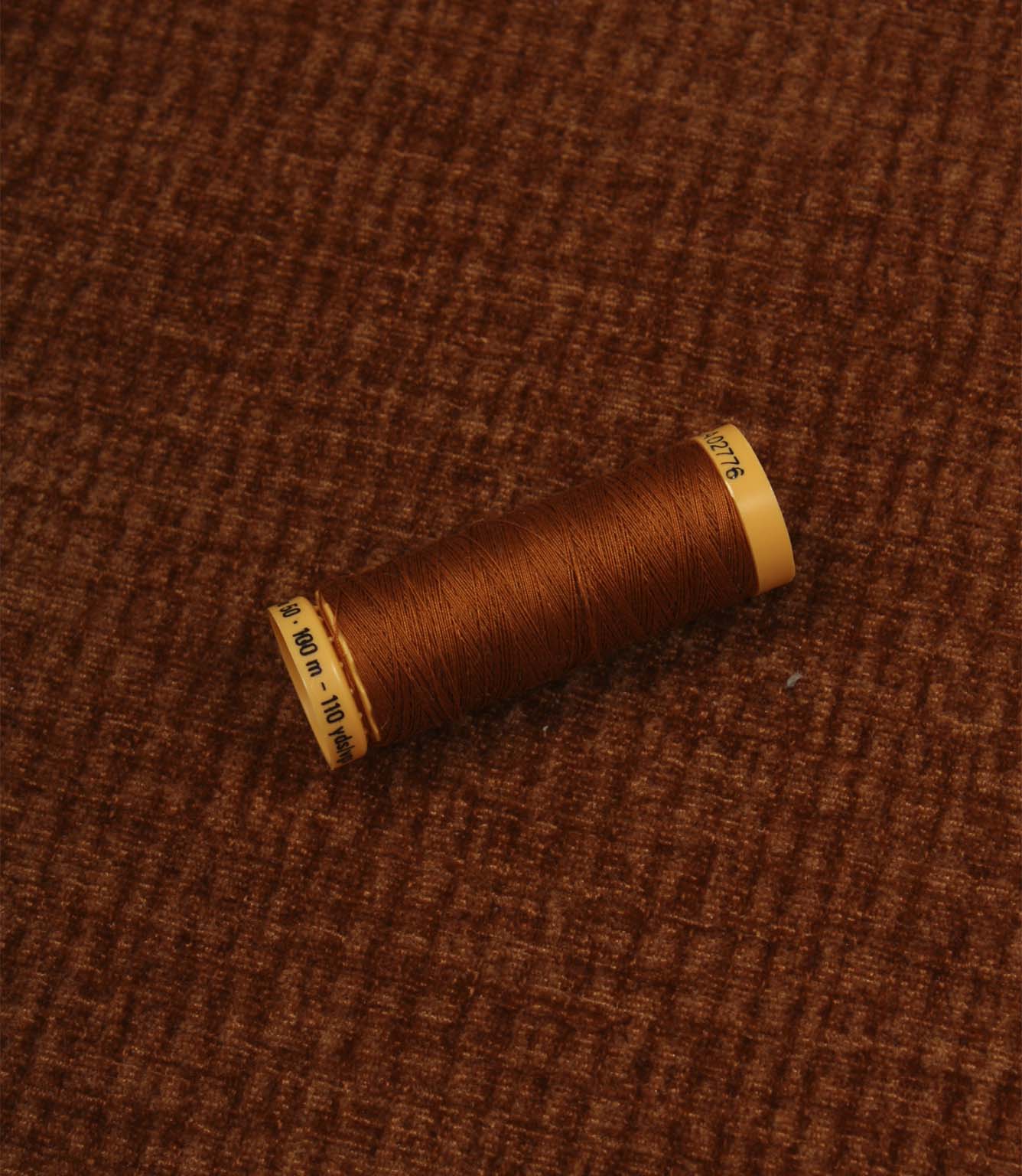 Everleigh Copper upholstery fire retardant fabric with coordinating copper thread, highlighting the textured plain design and velour-inspired finish.