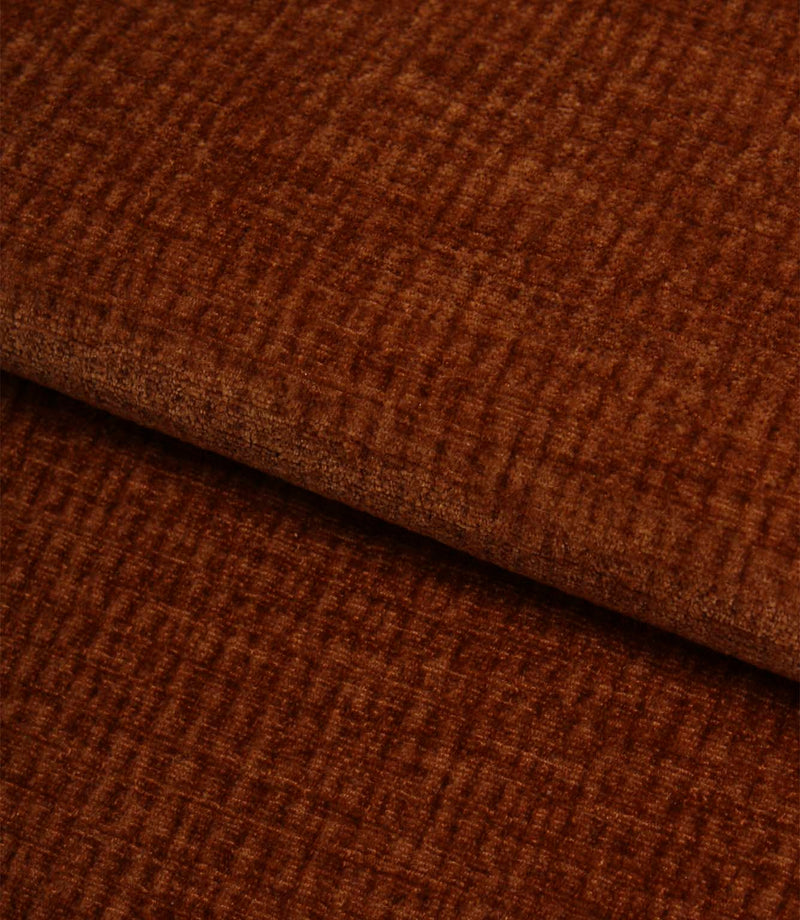 Folded Everleigh Copper plain upholstery fabric displaying its soft texture, rich copper colouring and premium upholstery quality.