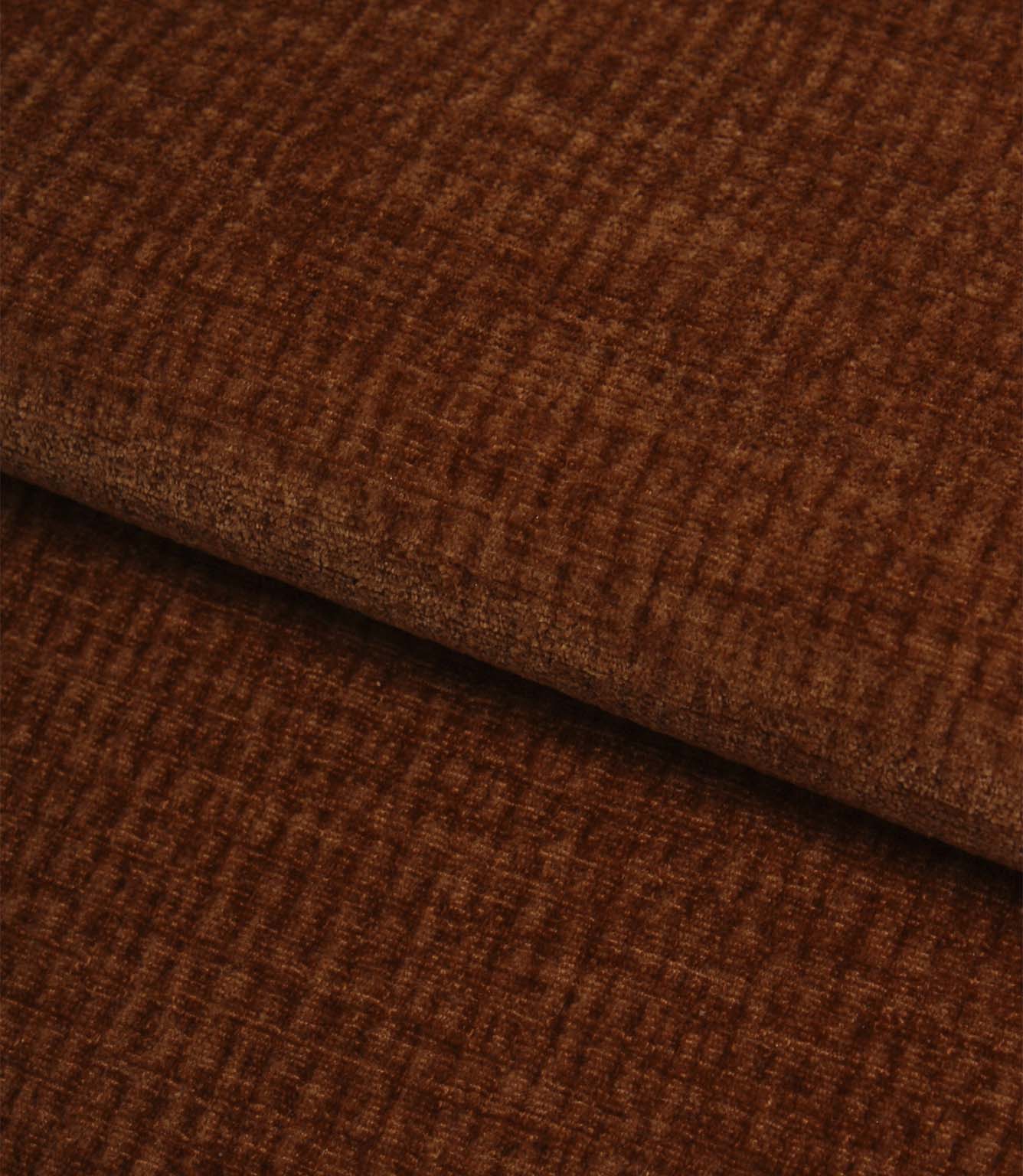Folded Everleigh Copper plain upholstery fabric displaying its soft texture, rich copper colouring and premium upholstery quality.