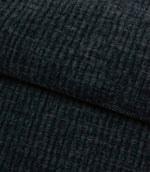 Folded Everleigh Denim plain upholstery fabric displaying its luxurious velour-inspired finish and textured denim blue appearance.