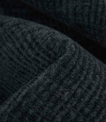 Detailed macro view of Everleigh Denim upholstery fire retardant fabric revealing the plush velour texture and subtle denim blue woven pattern.