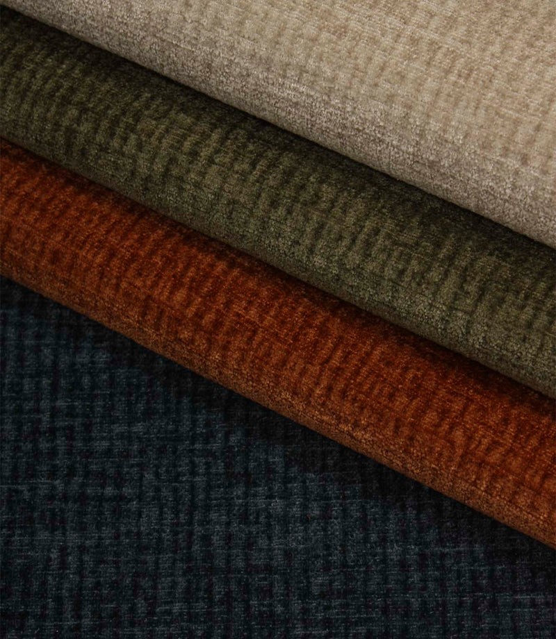 Everleigh upholstery fabric collection featuring Copper, Olive, Natural and Navy colourways with a textured plain velvet-look finish.