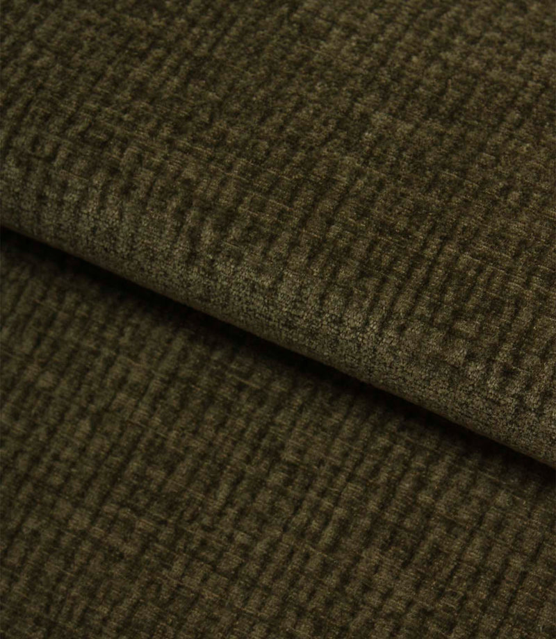Folded Everleigh Moss plain upholstery fabric displaying its luxurious velour-inspired finish and textured moss green appearance.