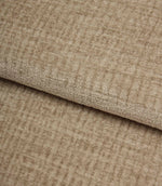 Folded Everleigh Pebble plain upholstery fabric displaying its luxurious velour-inspired finish and textured neutral appearance.