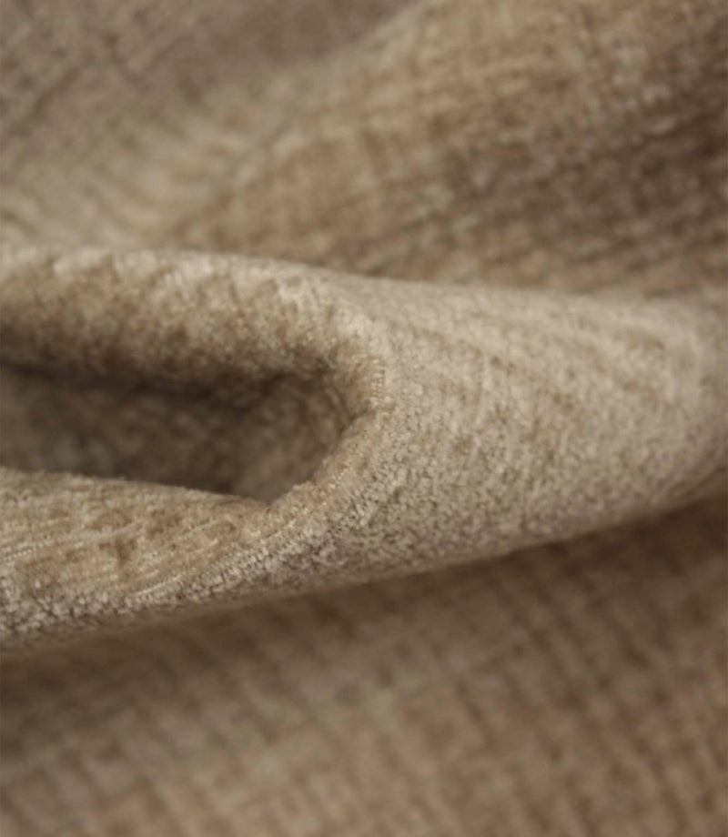 Detailed macro view of Everleigh Pebble upholstery fire retardant fabric revealing the plush velour texture and subtle pebble-toned woven pattern.