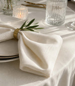 White napkin and tablecloth made from faux linen fabric