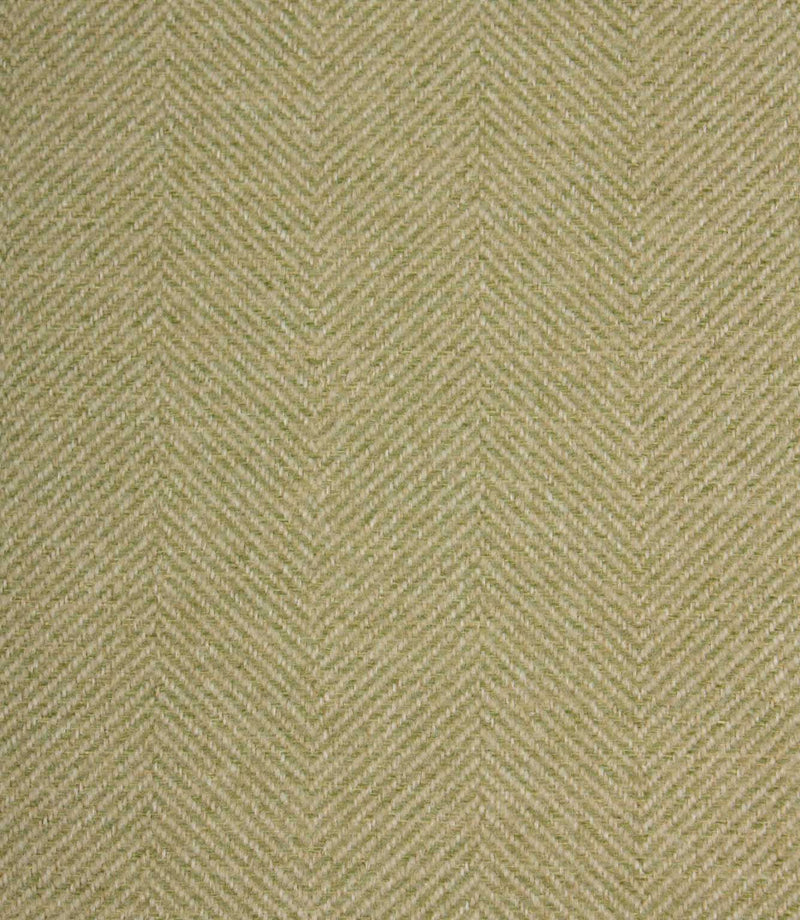 Textured fabric with a herringbone pattern in light green colour