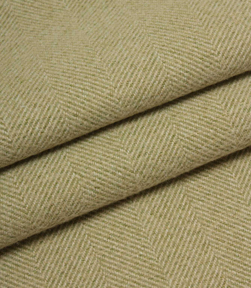 Close-up of green herringbone fabric