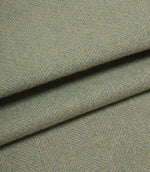 Close-up of blue and green herringbone fabric texture