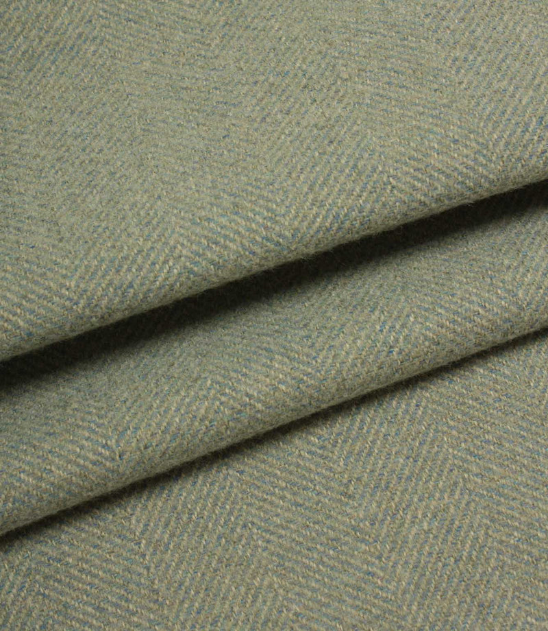 Close-up of blue and green herringbone fabric texture