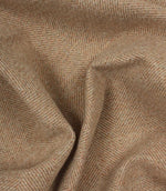 Close-up of blush and brown herringbone fabric texture