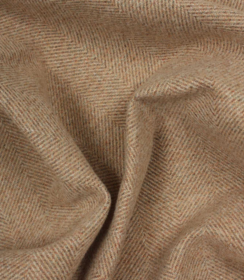 Close-up of blush and brown herringbone fabric texture