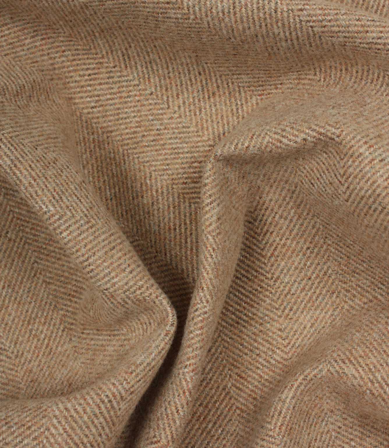 Close-up of blush and brown herringbone fabric texture