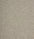 Textured fabric with a herringbone pattern in grey tones.