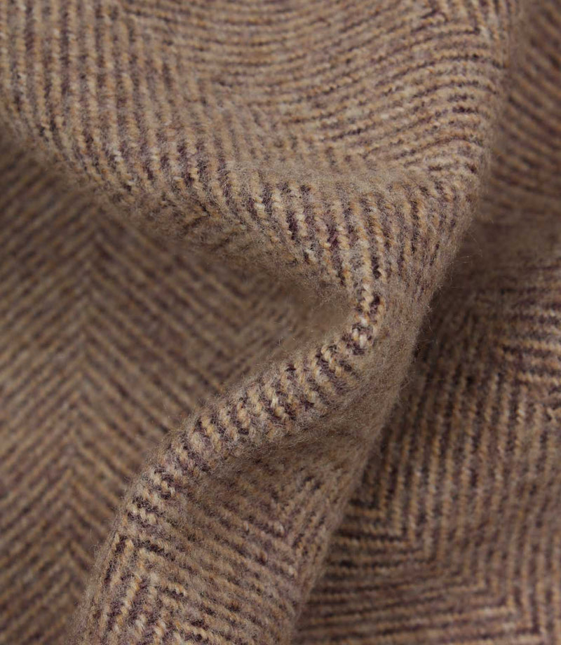 Close-up of purple herringbone fabric texture