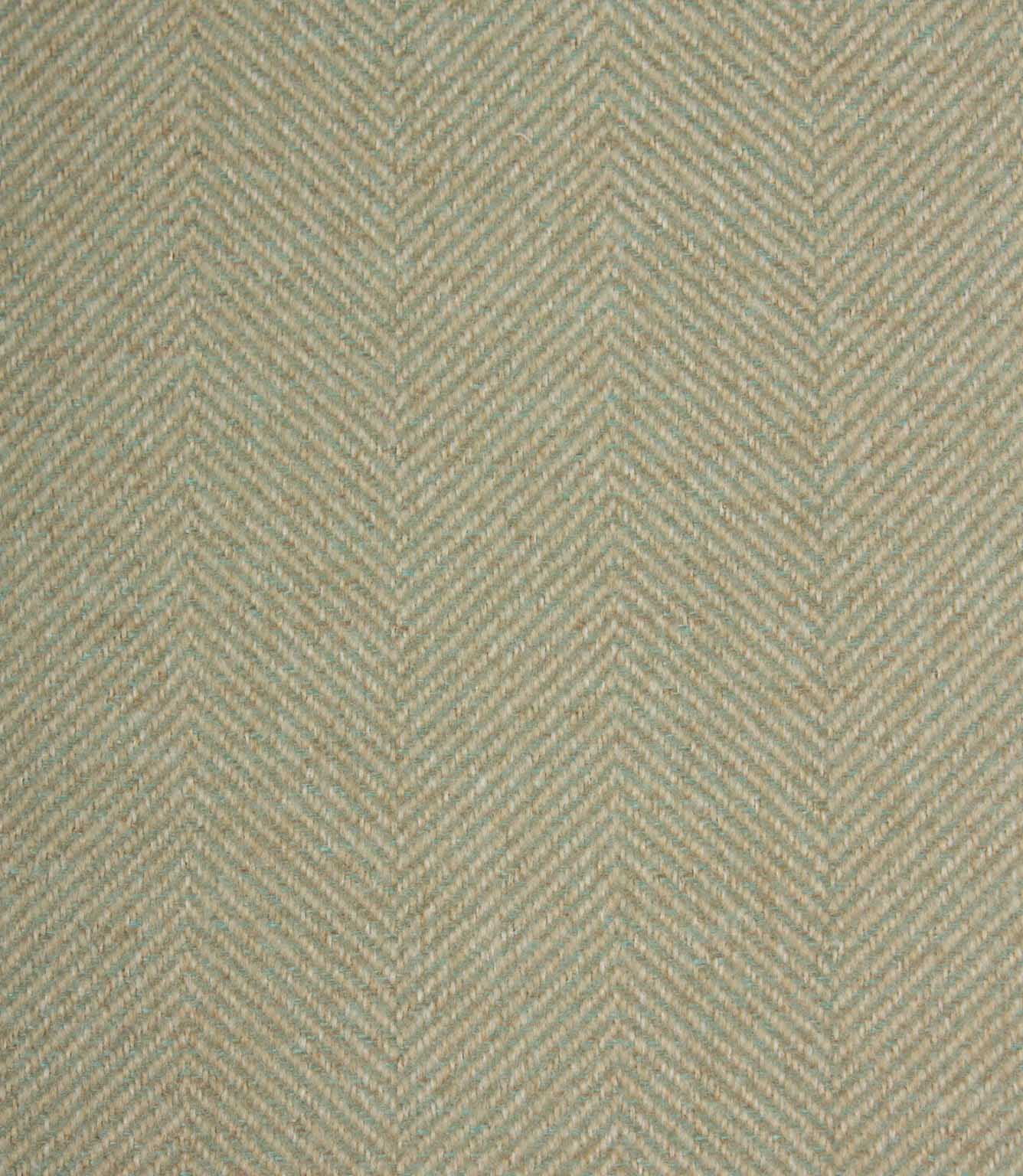 Textured fabric with a herringbone pattern in light green tones.