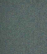 Textured fabric with a herringbone pattern in blue tones