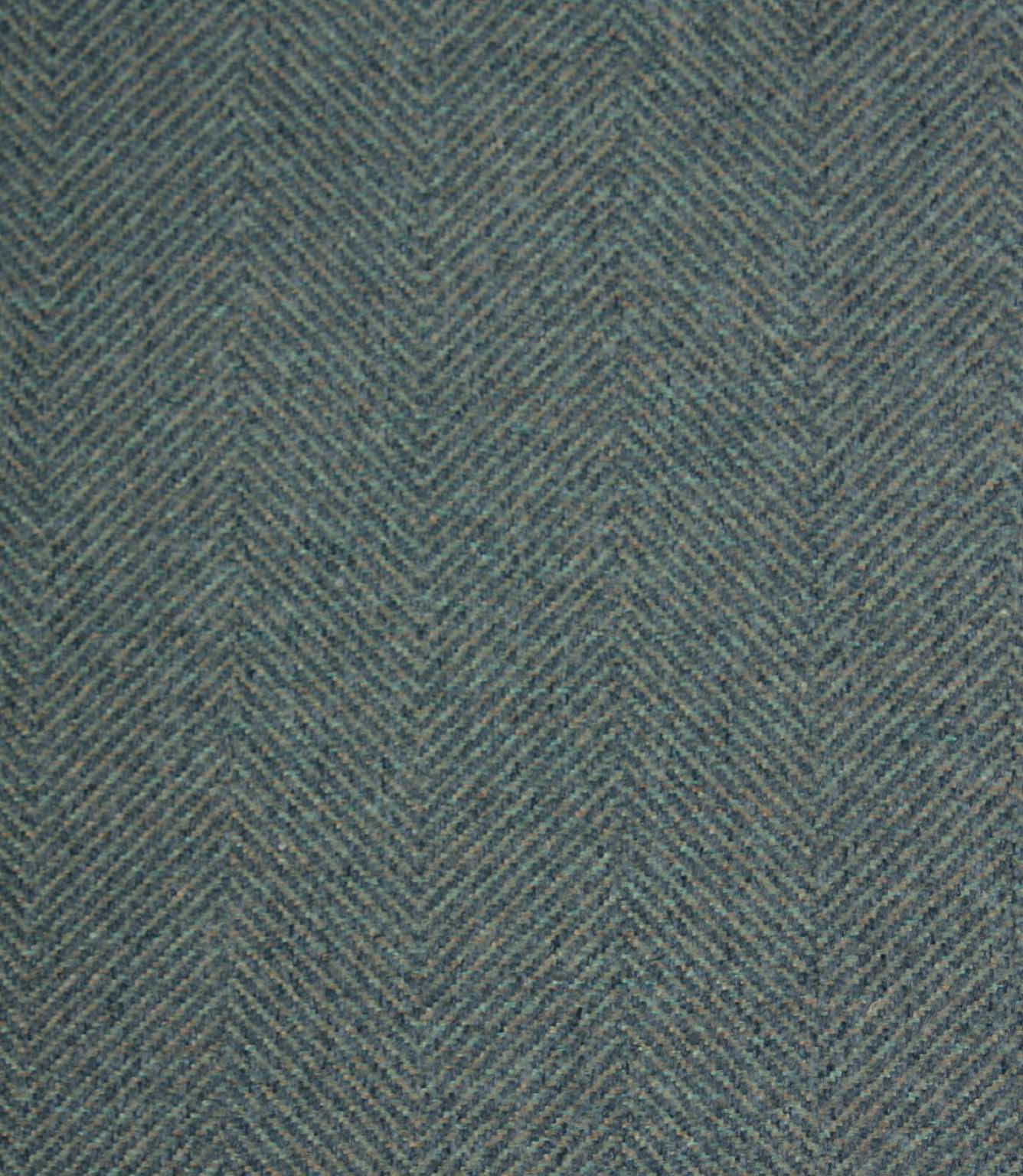 Textured fabric with a herringbone pattern in blue tones