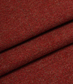 Close-up of red fabric with a subtle herringbone pattern