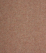 Textured fabric with a herringbone pattern in rose and beige tones.