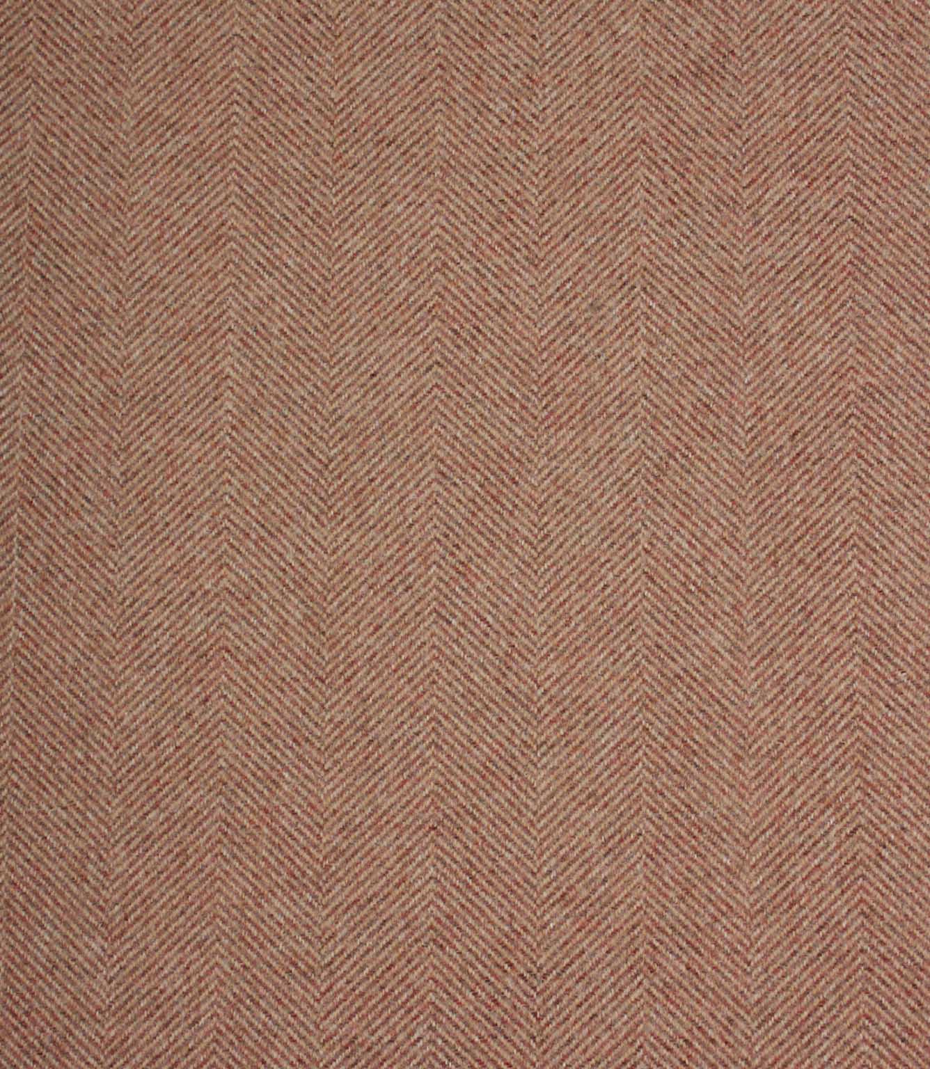 Rose coloured herringbone patterned fabric texture