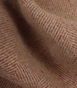 Close-up of rose fabric with a herringbone pattern