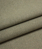 Close-up of green herringbone fabric texture