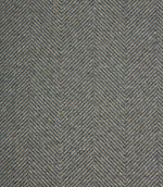 Textured fabric with a herringbone pattern in blue and beige tones.