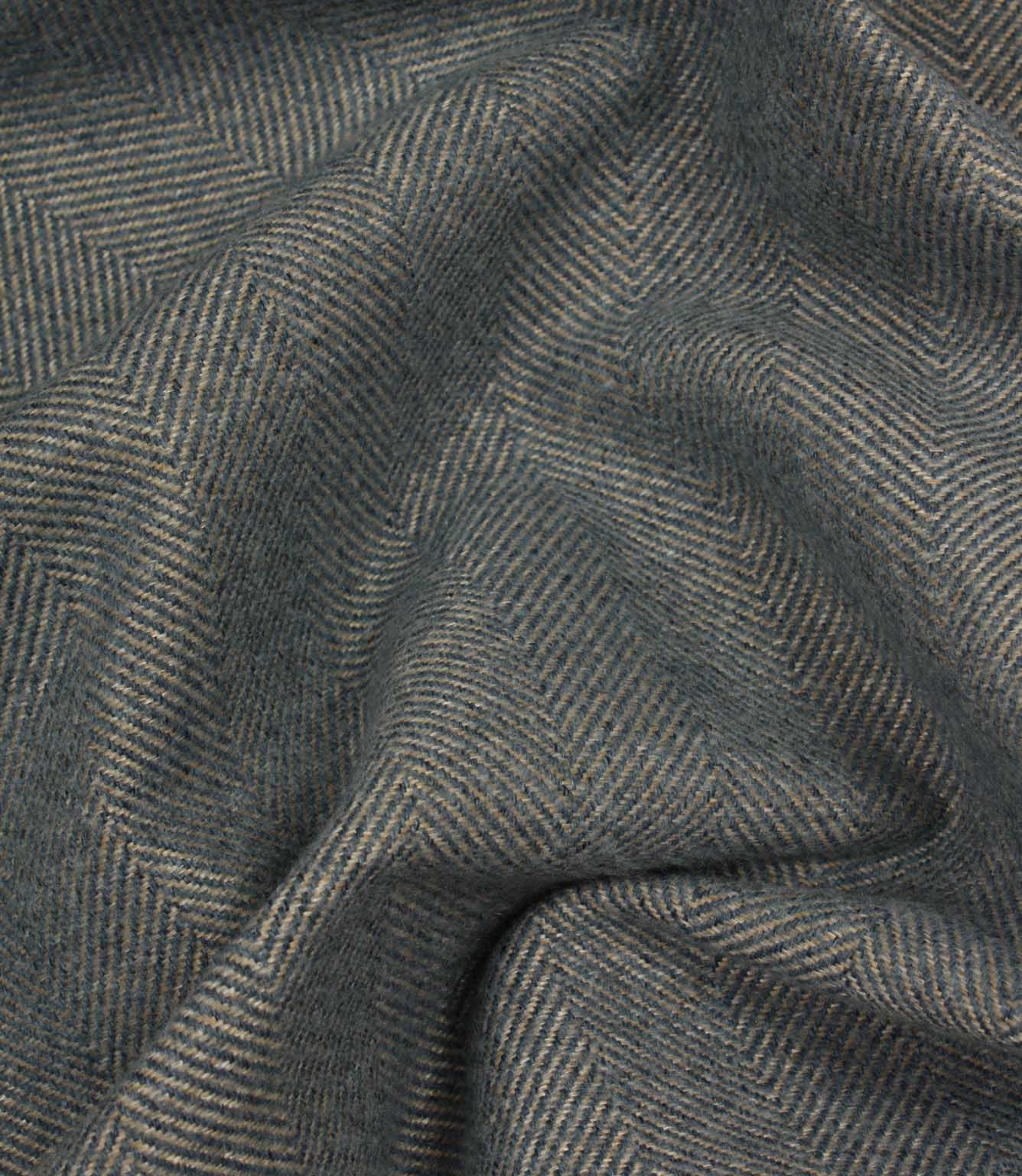 Close-up of blue herringbone fabric texture