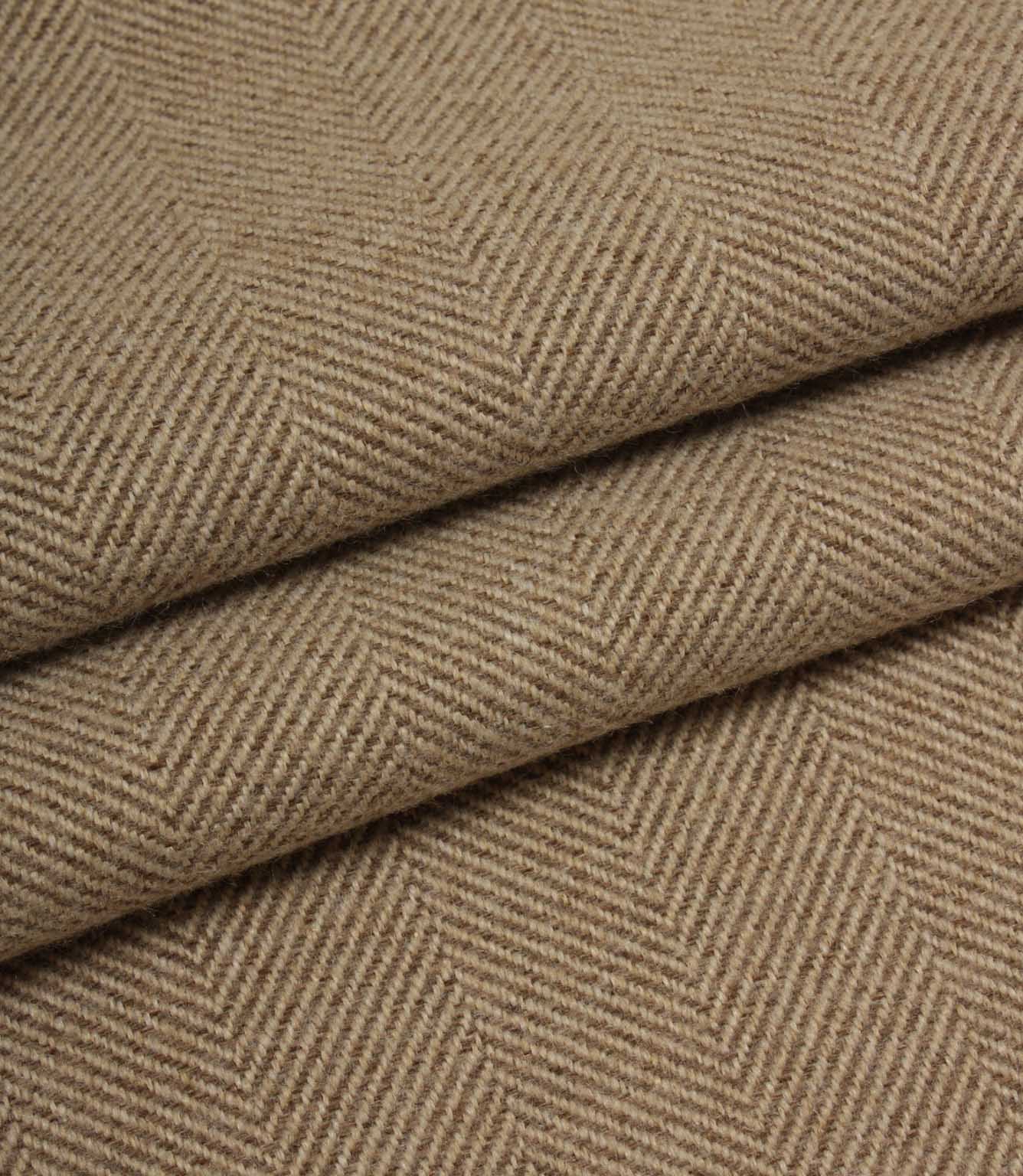 Close-up of brown herringbone fabric